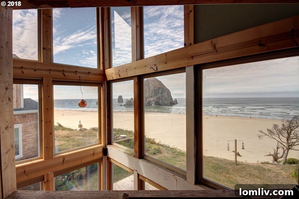 Interior view of a living space overlooking the ocean in Cannon Beach