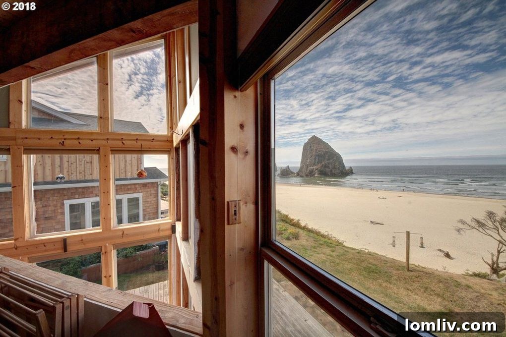 Panoramic ocean and Haystack Rock view from the tri-level Cannon Beach home