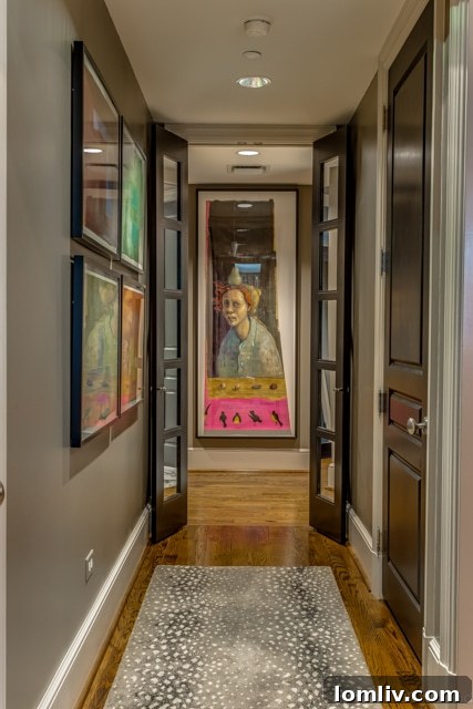 Jeanne Milligan's Sleek Vendome Residence Shines on Turtle Creek Home Tour 4 Jeanne Milligan collaborating with acclaimed interior designer Neal Stewart in her sophisticated Vendome residence, discussing art placement and decor.