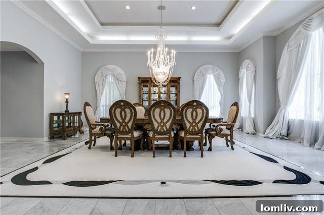 Luxurious master bathroom with a large jetted tub, separate shower with glass door, and elegant finishes in Victoria Neave's co-owned property.
