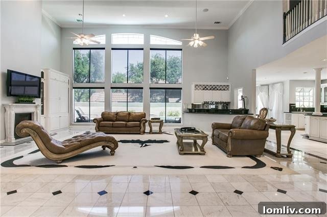An elegant living area complete with a full wet bar, designed for seamless entertaining and comfortable gatherings in the Abrams Road property.