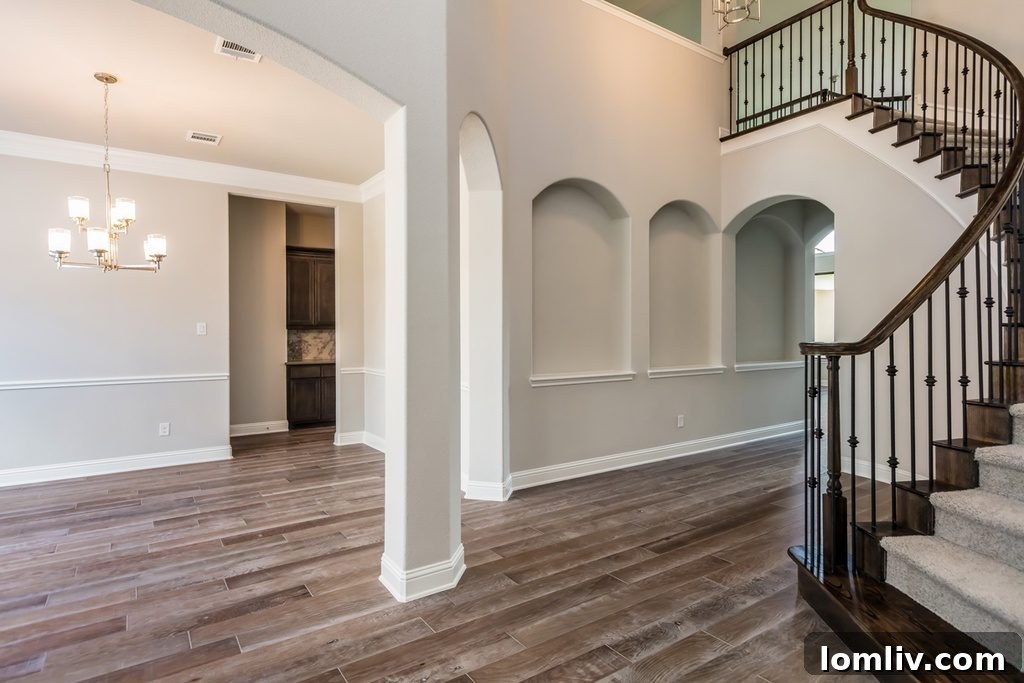 Beautiful Westworth Falls community landscape with mature trees and water feature