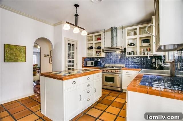 Bright and spacious kitchen with a professional Wolf range and open shelving