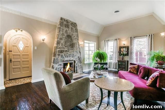 Grand foyer with original tile flooring and classic Tudor design elements