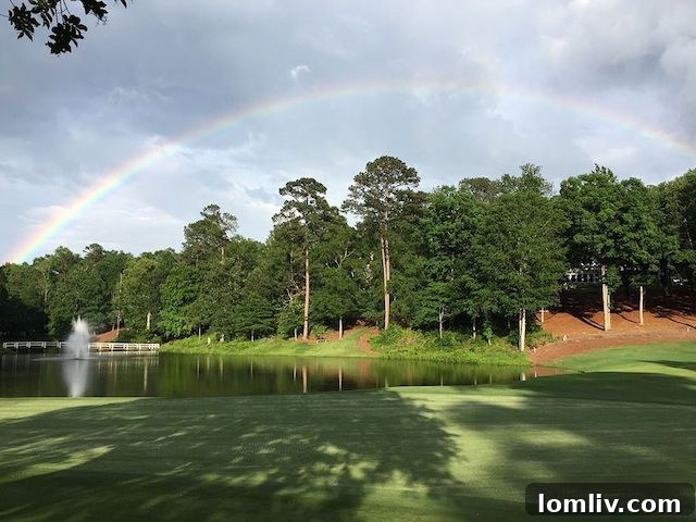 Elegant home exterior overlooking a golf course and Lake Oconee