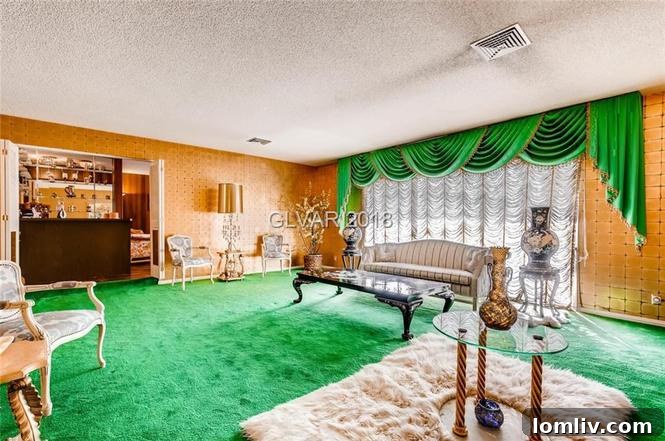 Another view of the living room, showing the fluffy white carpet