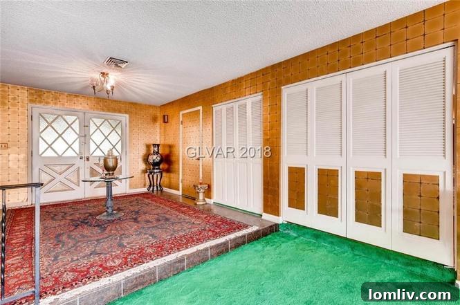 Interior space with accordion doors closed, hinting at hidden rooms