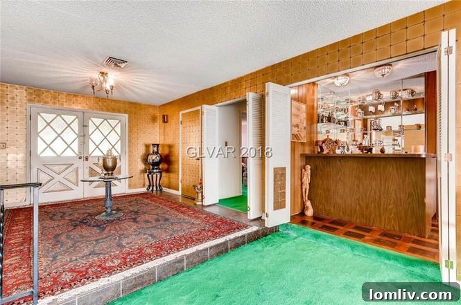 Accordion doors open, revealing a vibrant, dated interior