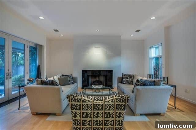 Spacious great room with contemporary fireplace in Merriman Park Estates
