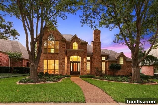 Spacious kitchen with granite countertops and modern appliances in Plano home