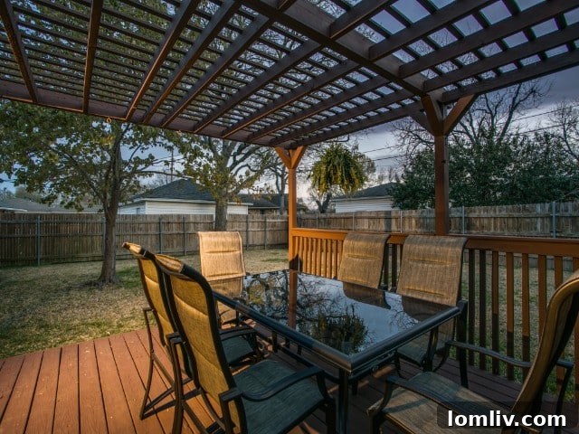 Elegant outdoor patio furniture arrangement, perfect for sophisticated entertaining in the spacious backyard
