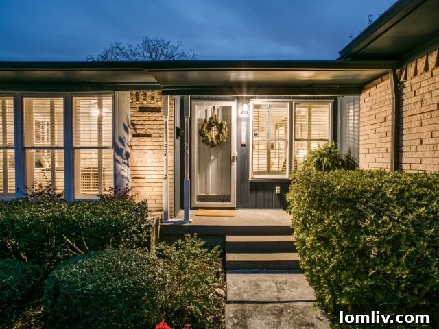 Well-maintained front yard and inviting porch of a ranch house in the L Streets, Dallas