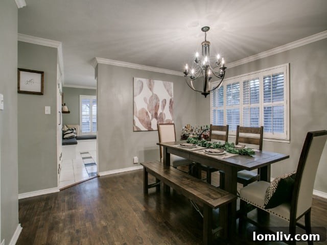 Modern and inviting kitchen featuring built-in banquette seating and generous counter space, 9017 Livenshire Dr