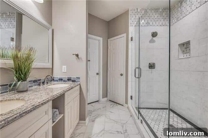 Euless: Where Close-Knit Sundays Define Ideal Suburban Living 11 Stylish bathroom with custom tile at 401 Calvary Drive