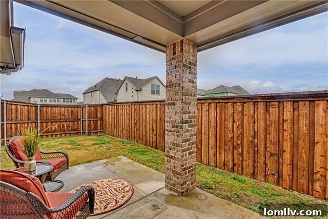 Euless: Where Close-Knit Sundays Define Ideal Suburban Living 17 Bathroom with dual vanity and walk-in shower at 1415 Huntsman Ridge Lane