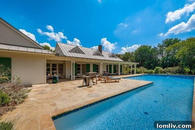 Olympic-Sized Lap Pool Integrated into Limestone Landscape