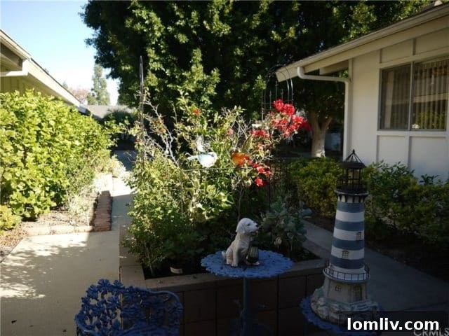Laguna Woods condo exterior with trees obscuring the view, highlighting unusual real estate photography
