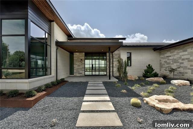 Modern living room with floor-to-ceiling windows overlooking a golf course