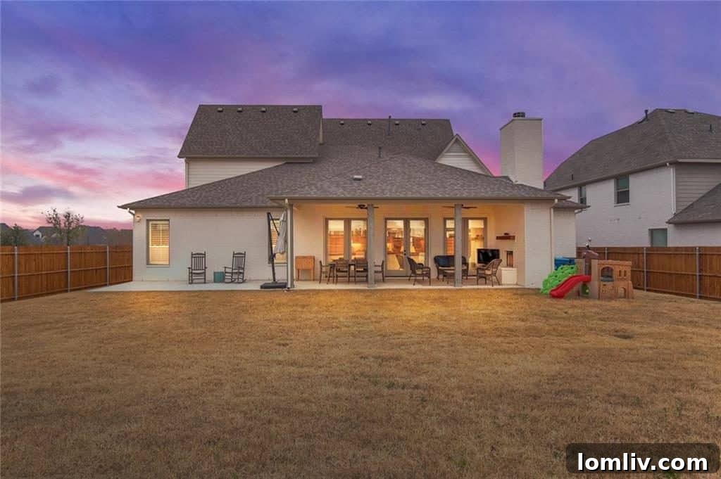 An inviting backyard and oversized patio at 612 Rockledge Court, perfect for enjoying Aledo sunsets and outdoor entertaining.
