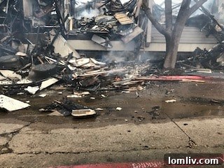 Close-up view of burned debris from Preston Place