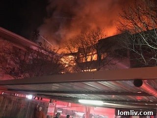 Smoke rising from the Preston Place fire aftermath