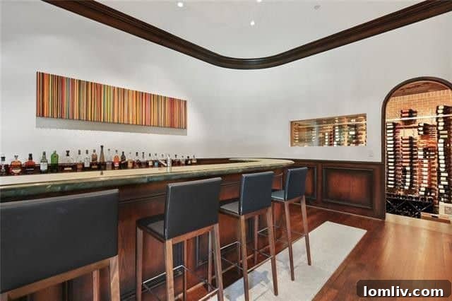 Bluffview's Finest Open Houses Limited Engagement 11 Luxurious living space designed by David Cadwallader, featuring fine art lighting.