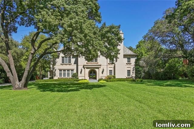 Bluffview's Finest Open Houses Limited Engagement 8 Grand exterior of a French Traditional Bluffview estate set on over an acre of land.