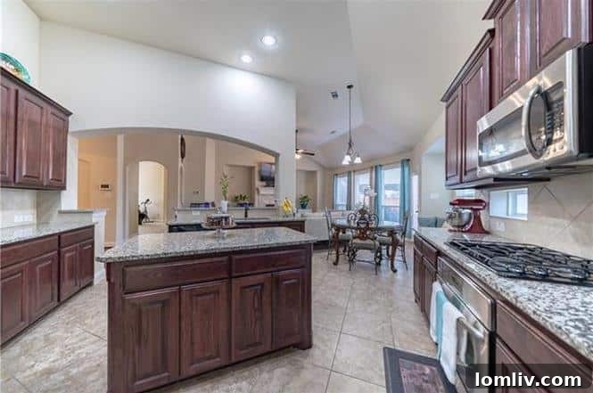 Elegant dining area with decorative light fixture