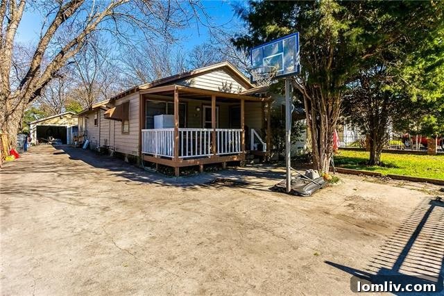 Charming traditional home exterior at 7143 Bramlett Drive, Dallas