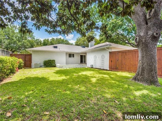 Spacious and private backyard with mature trees, perfect for outdoor living and entertaining