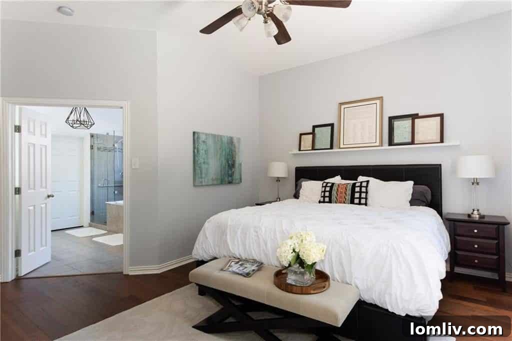 Brightly renovated second bedroom with natural light
