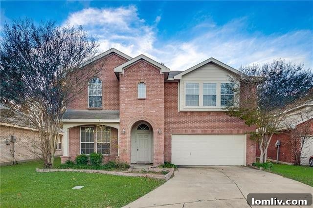 Two-story family home exterior at 1910 Pin Oak Lane