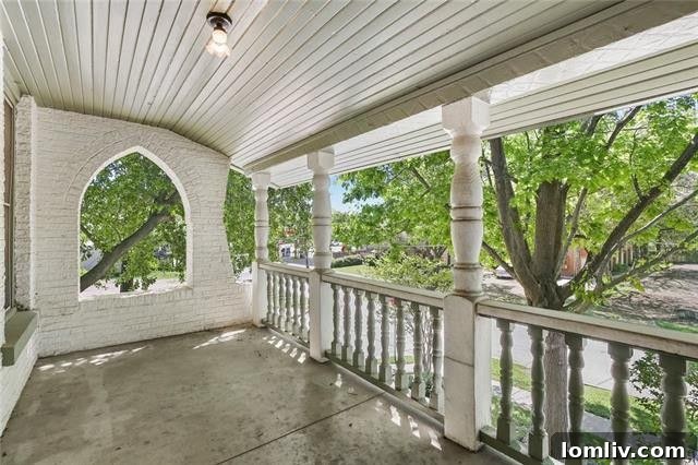 Spacious living area with gleaming hardwood floors and abundant natural light in the Dallas duplex