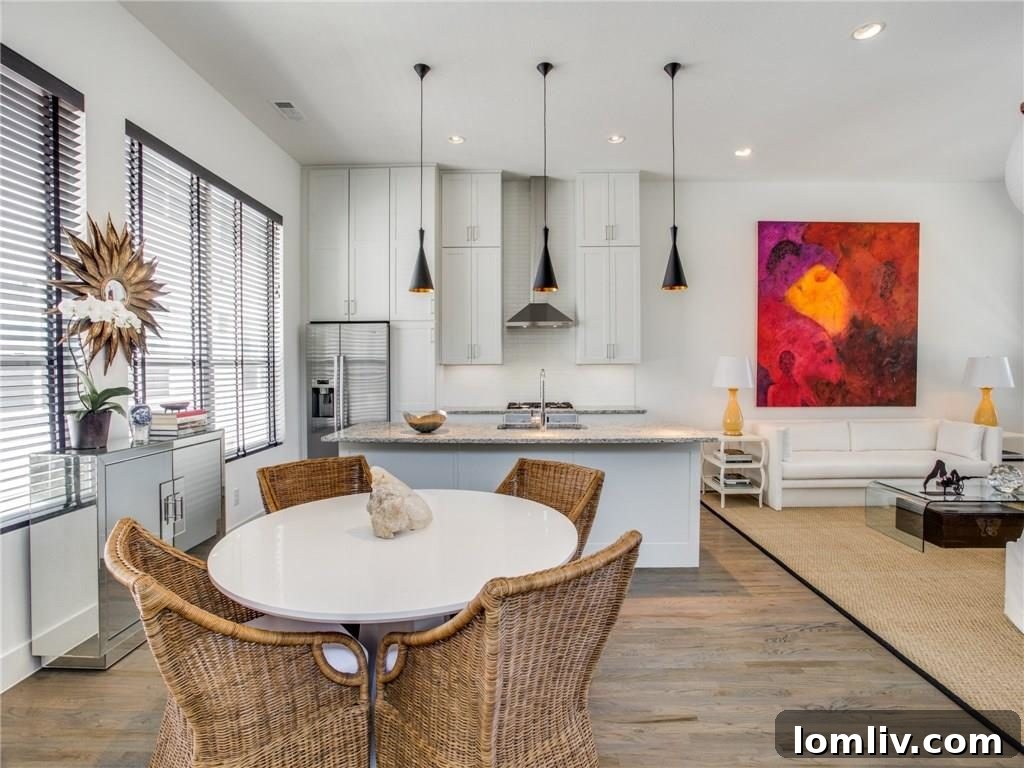 Sun-drenched open concept living area of 5811 Lindell Ave Dallas townhome