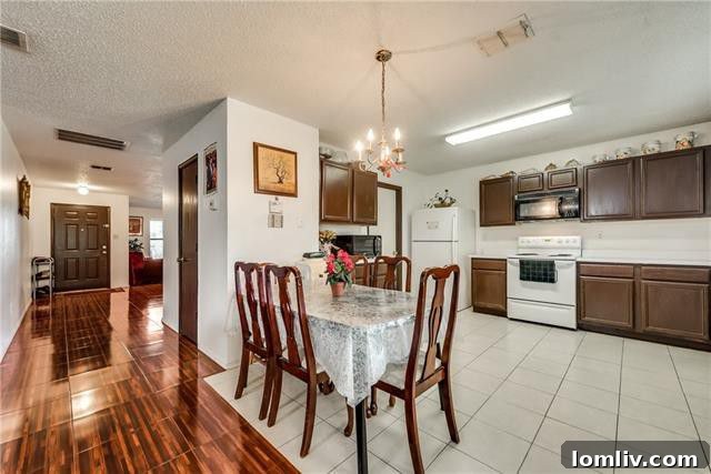 Open kitchen with breakfast nook and ample cabinet space at 2824 Quail Run Drive