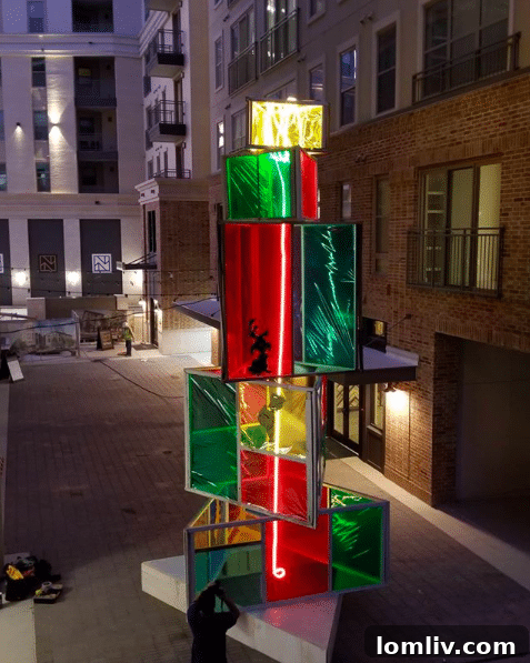 The Grinch-themed Christmas tree at Novel Bishop Arts, a symbol of community engagement