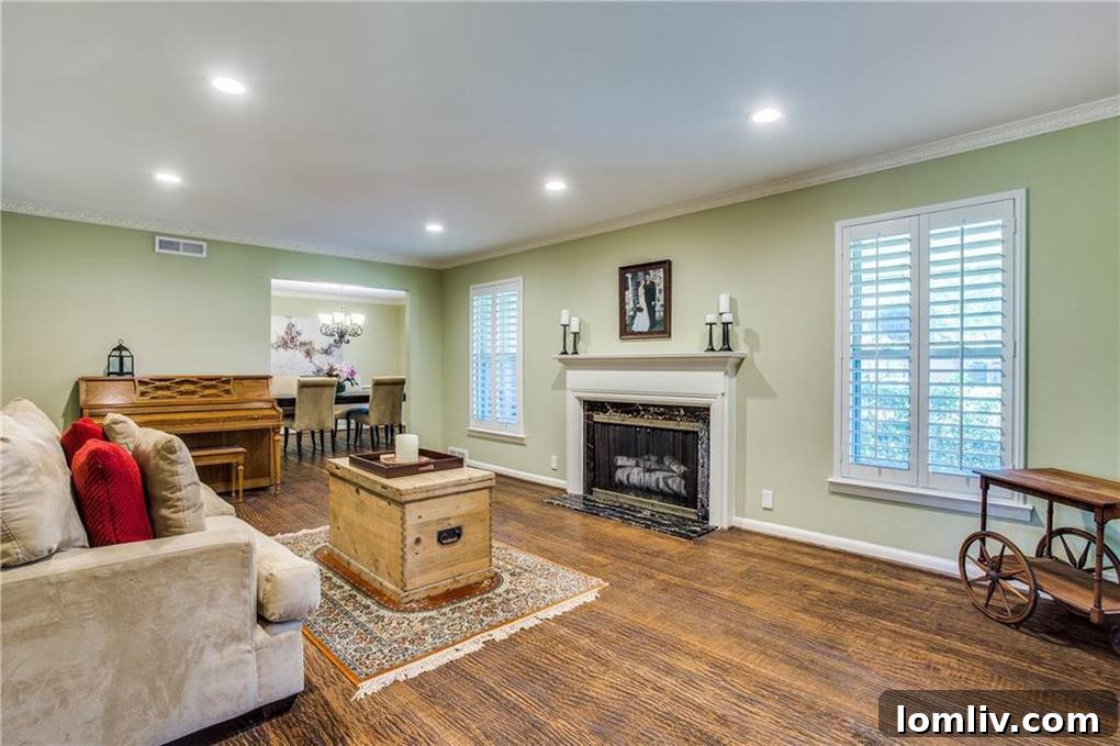 Kramer Zoned Dream Home Steps to School 3 Spacious backyard with covered porch and mature trees at 7124 Midbury Drive