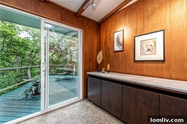 Mid-Century Modern living space with mixed materials: stone walls, wood paneling, and inviting ambiance