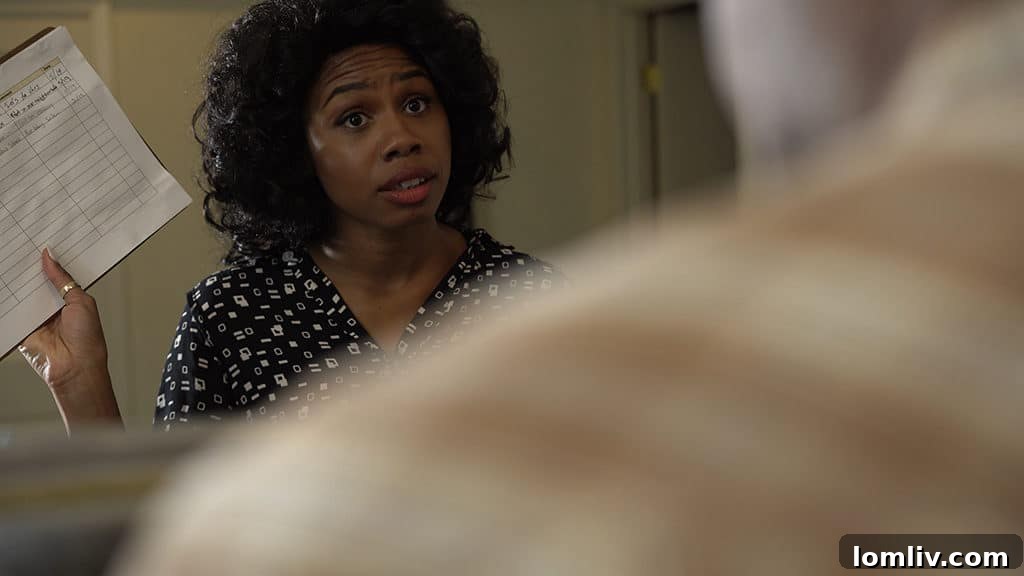 Tiana Kaye Blair, DTC Resident Artist, in a scene from 'penny candy' at the Dallas Theater Center
