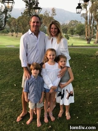 The LaGere family enjoying their restored Park Cities Tudor home