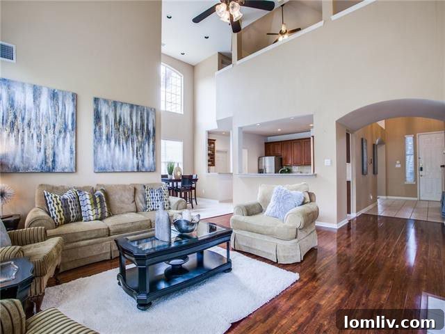 Elegant Living Room with Vaulted Ceilings and Natural Light