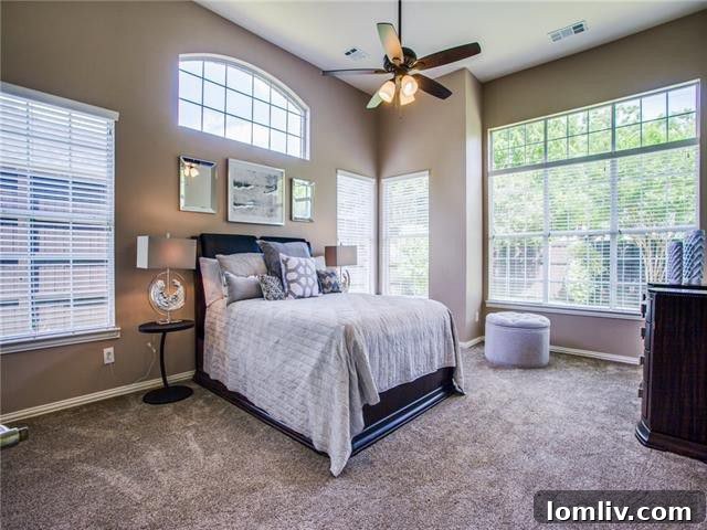 Spacious Master Bedroom with High Ceilings and Natural Light