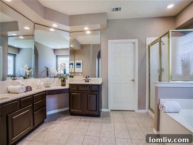 Luxurious Master Bathroom with Garden Tub and Dual Vanities