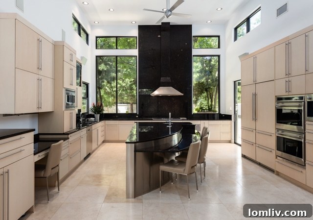 Luxurious master bedroom with expansive windows and private garden view
