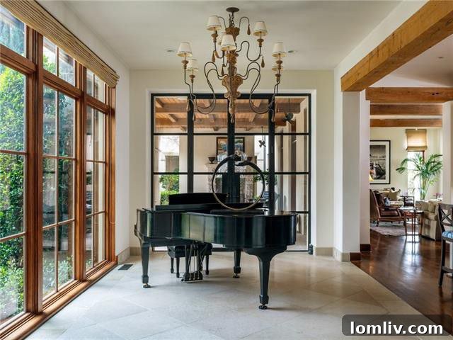 Storied Mediterranean Splendor 7 Spacious dining area with elegant lighting and garden views