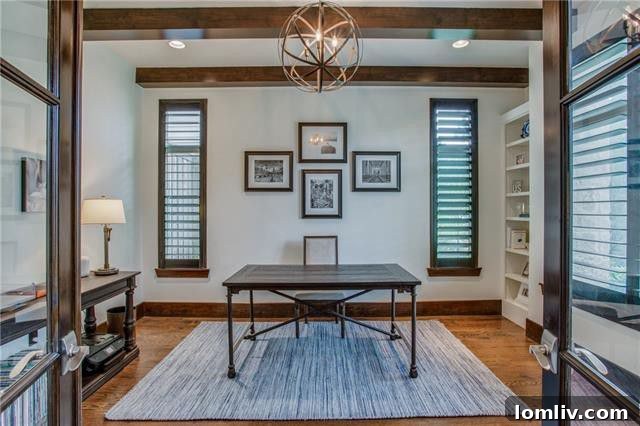 Contemporary living room with modern decor and ample natural light.