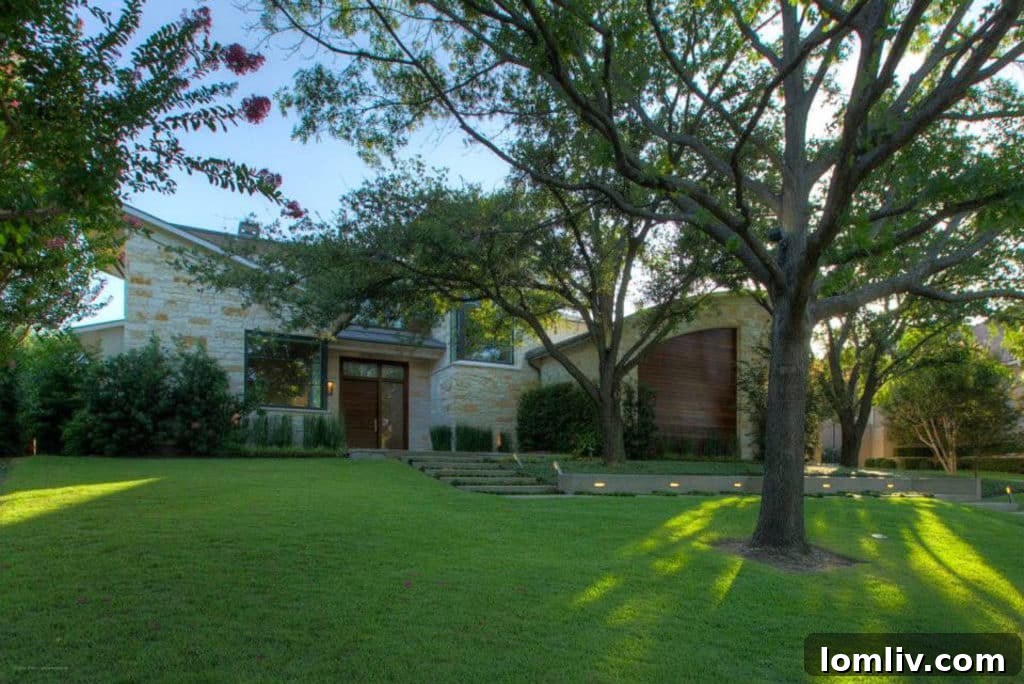 A meticulously designed landscape demonstrating harmony between hardscapes and softscapes, enhancing the architectural features of a home. (Photo: Zachary Custom Homes)