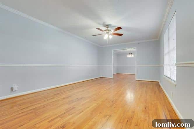 Refurbished Bathroom with Fresh Paint and Hardwood Floors