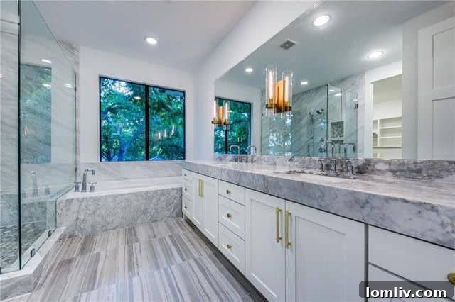Luxurious master bedroom with sitting area and trey ceilings