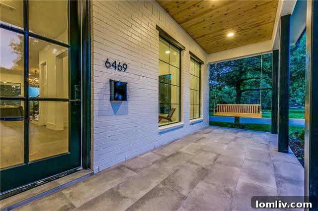 Charming front porch with swing and inviting curb appeal